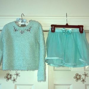 Girls sweater and skirt.